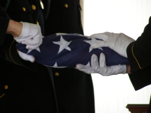 Karl Fritz flag folding at Arlington National Cemetery. Photo by Leanna Elise Long, 2007